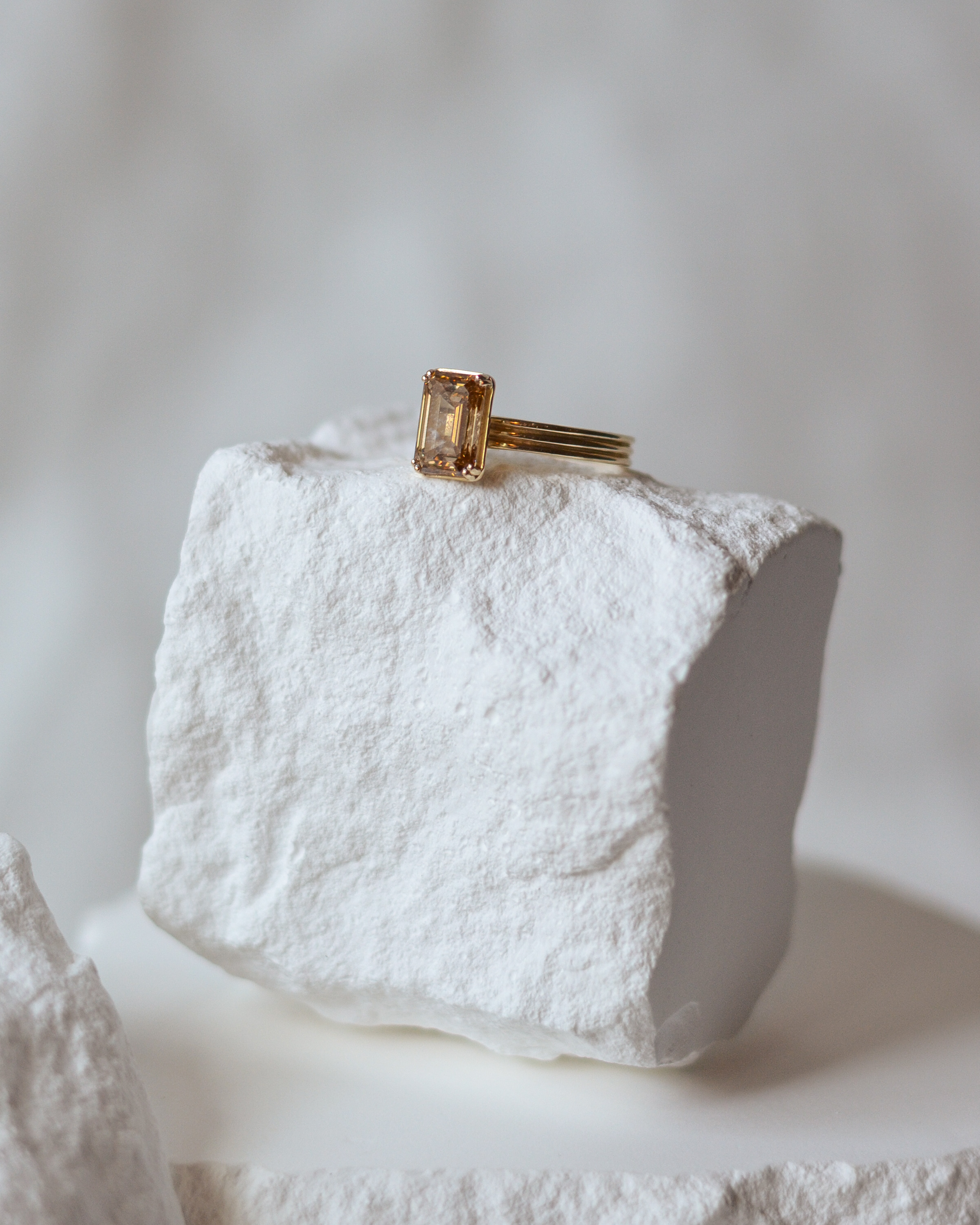 yellow gold solitaire engagement ring close up — warm tone custom fine jewelry by Kalakari